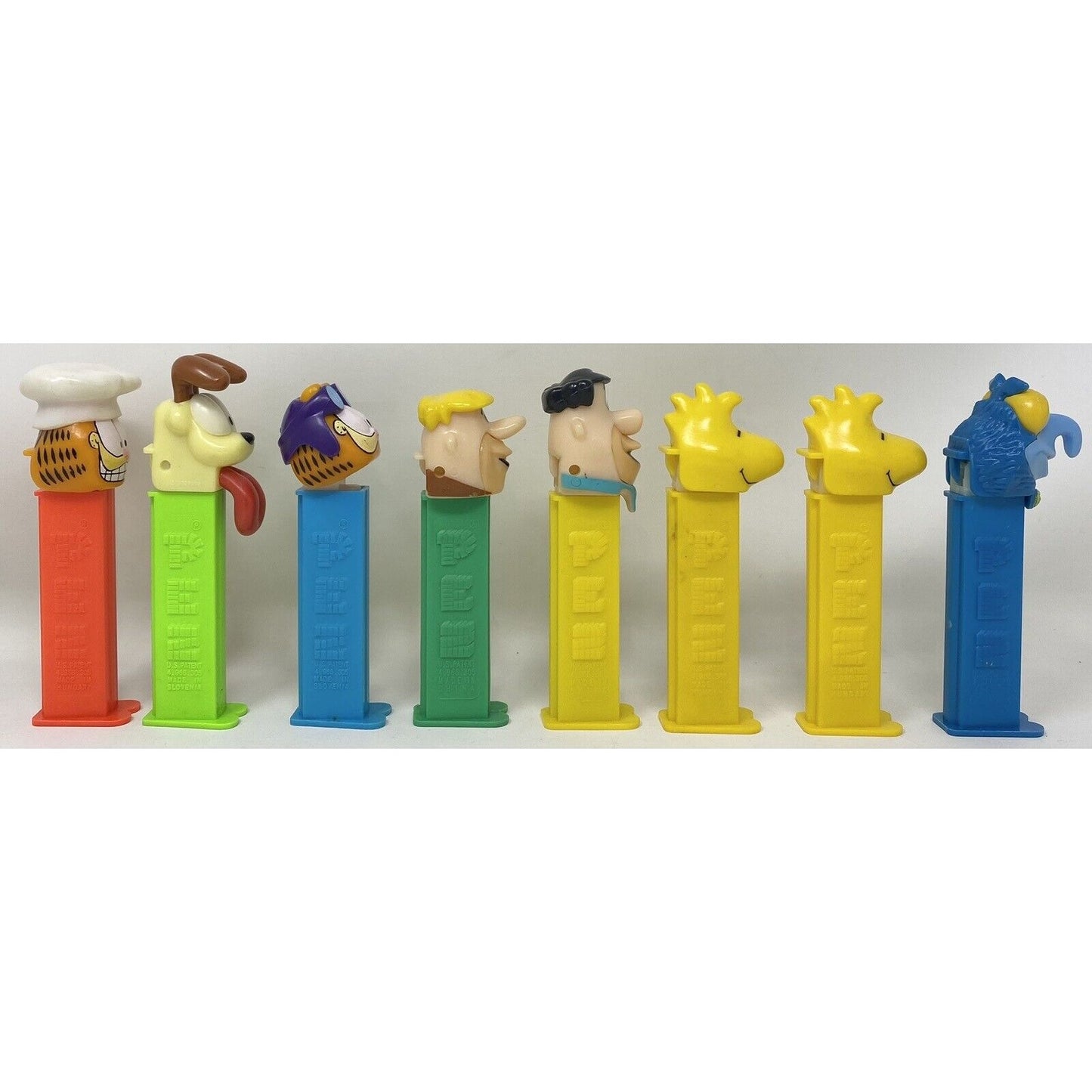 Mixed Lot of 8 Garfield Flintstones Gonzo Muppet Woodstock PEZ Candy Dispensers