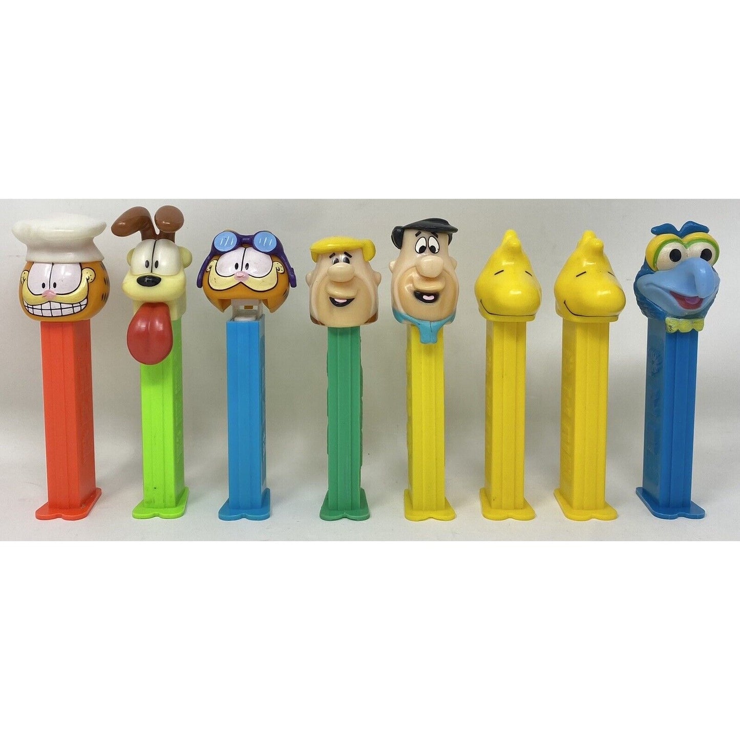 Mixed Lot of 8 Garfield Flintstones Gonzo Muppet Woodstock PEZ Candy Dispensers