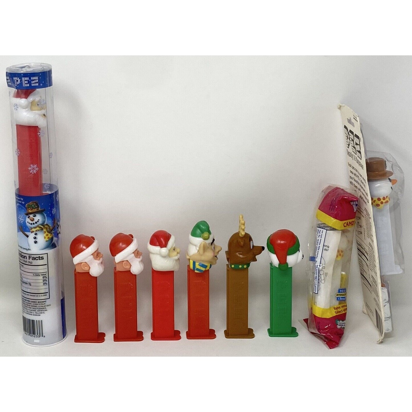 Lot of 9 Holiday Xmas Christmas Snowman Santa Claus Elf PEZ Candy Dispensers
