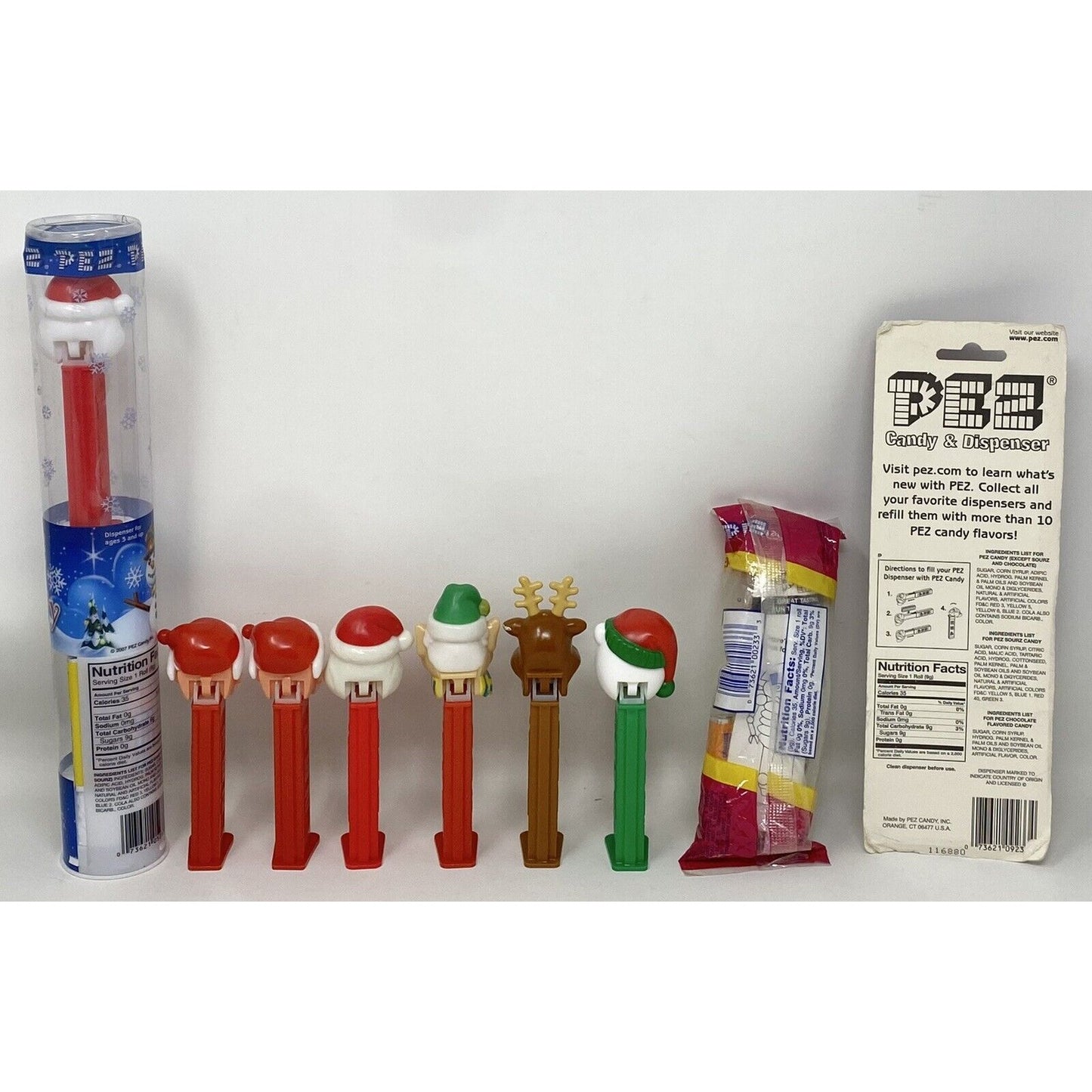 Lot of 9 Holiday Xmas Christmas Snowman Santa Claus Elf PEZ Candy Dispensers